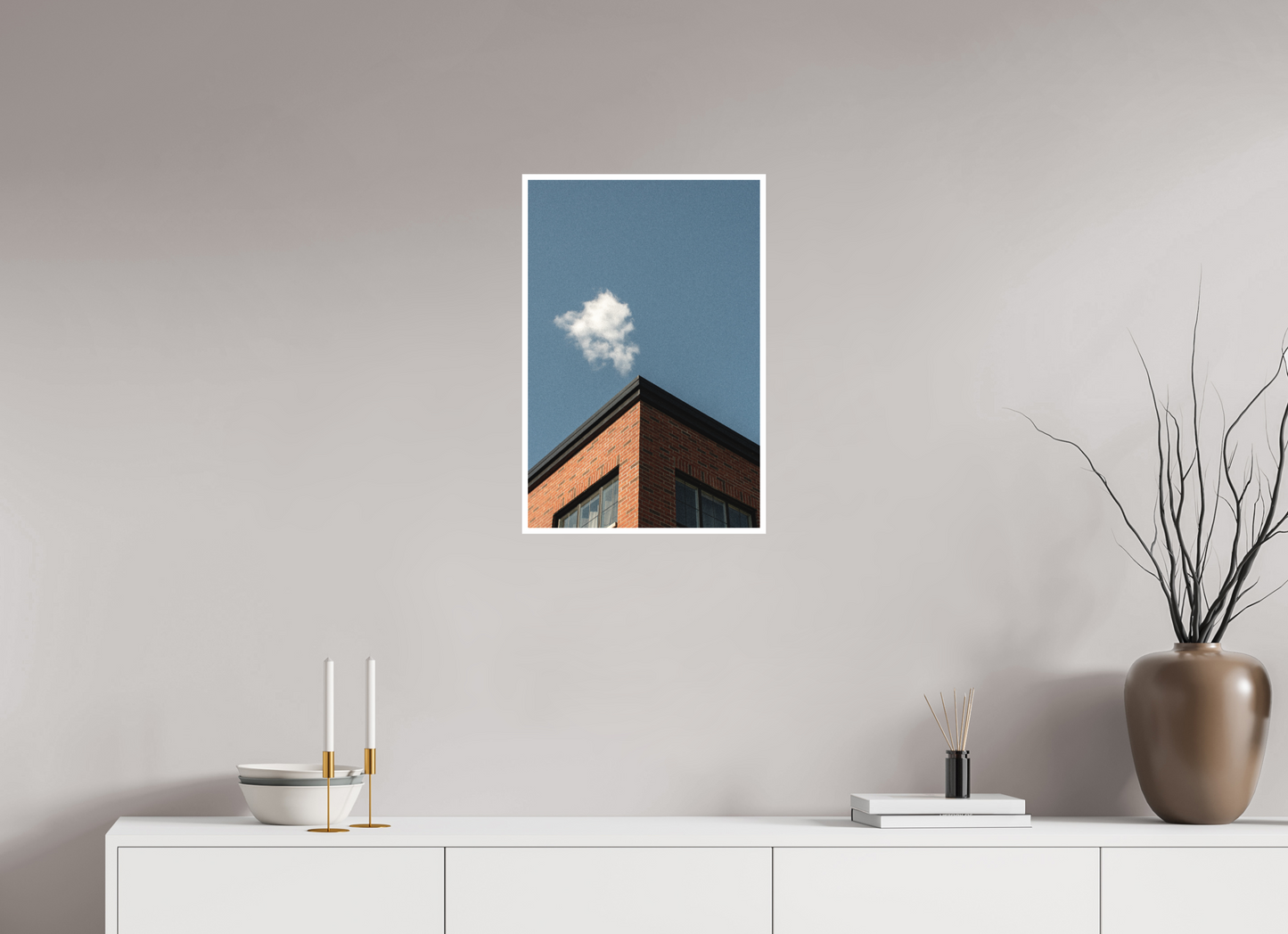 Cloud hovers above a building